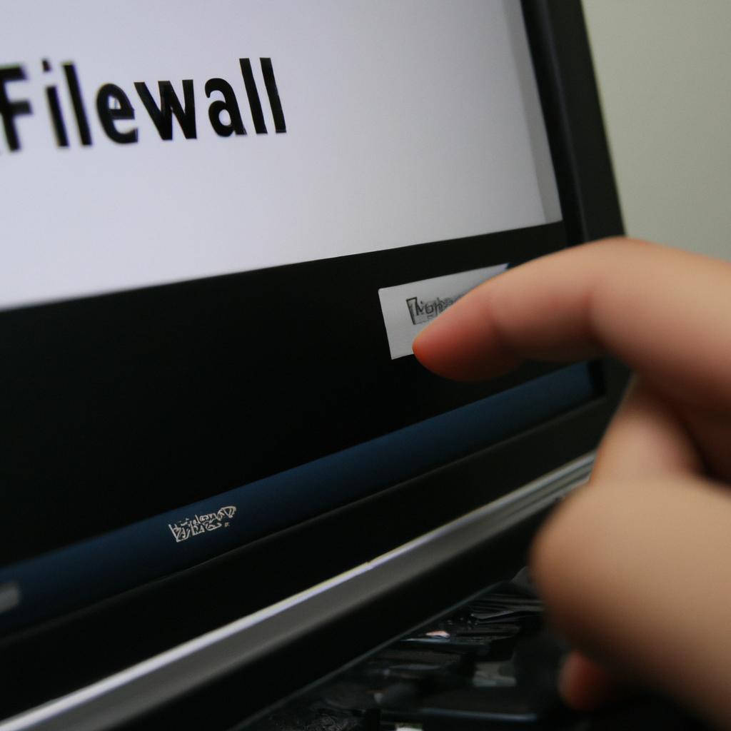 Person configuring firewall on computer